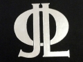 Initials for JLO, Personal embossed silver monogram on hard cover book.