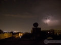 Purple lightning in Brooklyn New York from a rooftop.