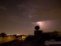 Purple lightning in Brooklyn New York from a rooftop.
